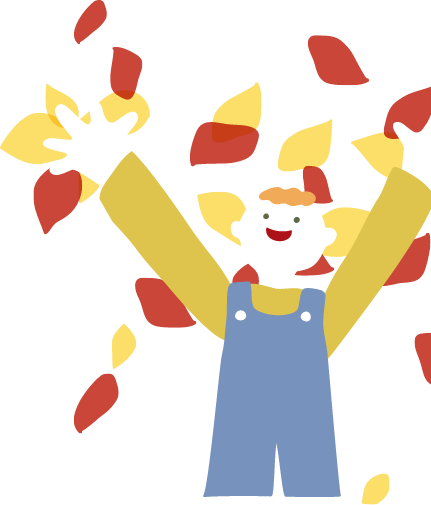 枯葉で遊ぶ子ども